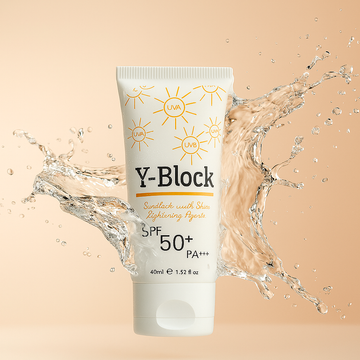 Y-Block sunscreen tube with water splashes on a beige background